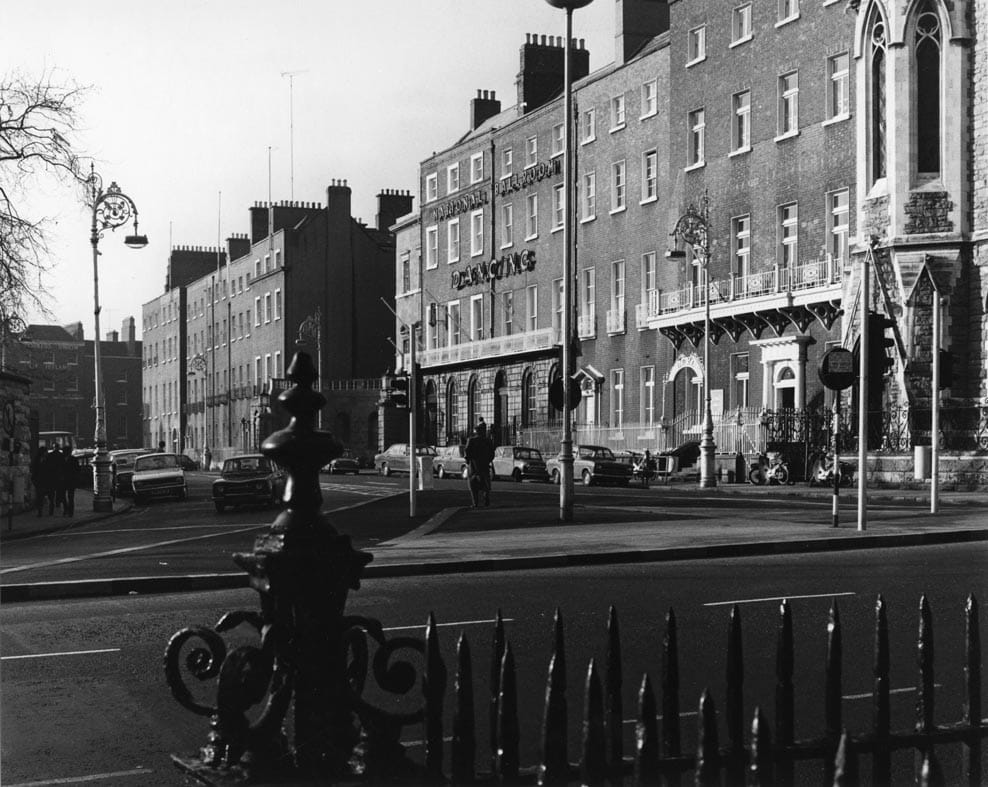 Black and white photograph of the north side of Parnell Square, Dublin, taken from steps of No. 14. Parnell Sqaure by David Davison in 1974.