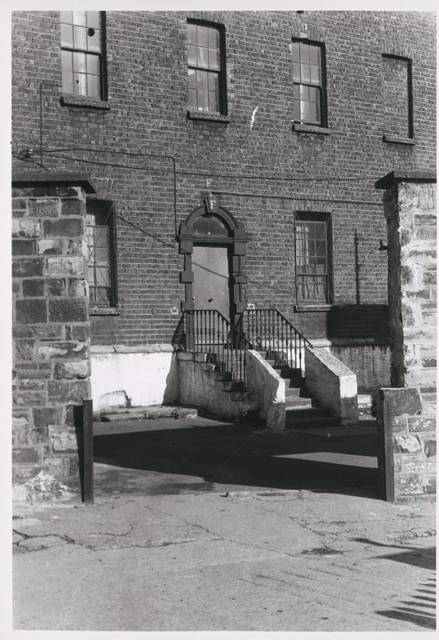Black and white photograph taken by Paddy Healy in about 1960 showing the door to the Marshal's House, Marshalsea, Dublin.