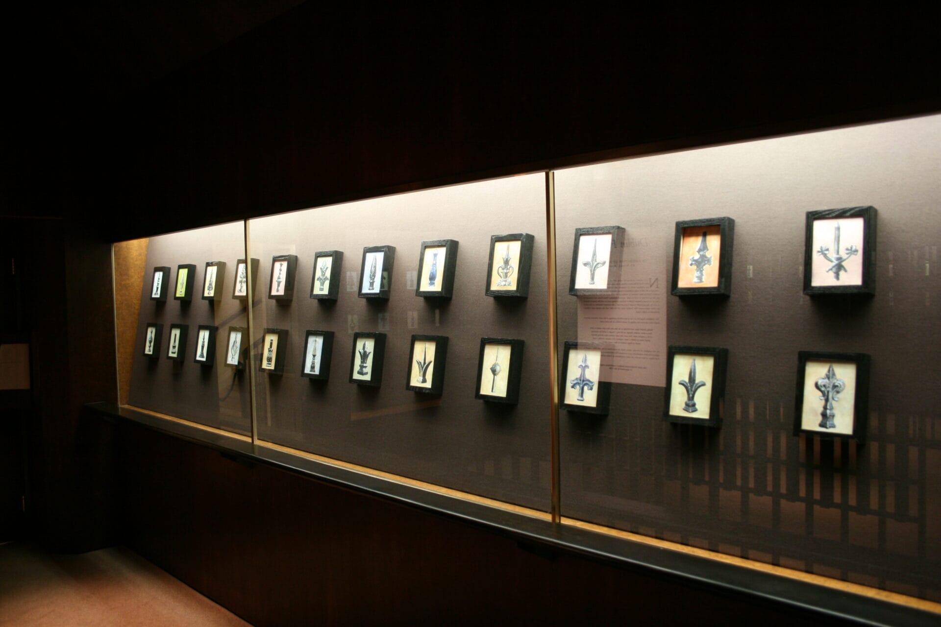 Painting hanging in a glass case