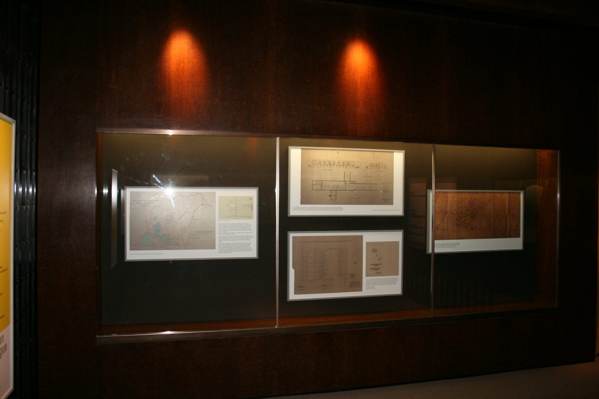 Blueprints in a display case