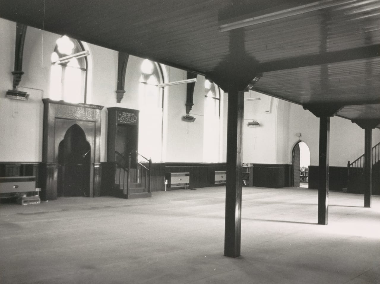 Black and white photograph taken in 1990 of the interior of the former Donore Presbyterian Church, South Circular Road, Dublin, following its conversion to use as a mosque.